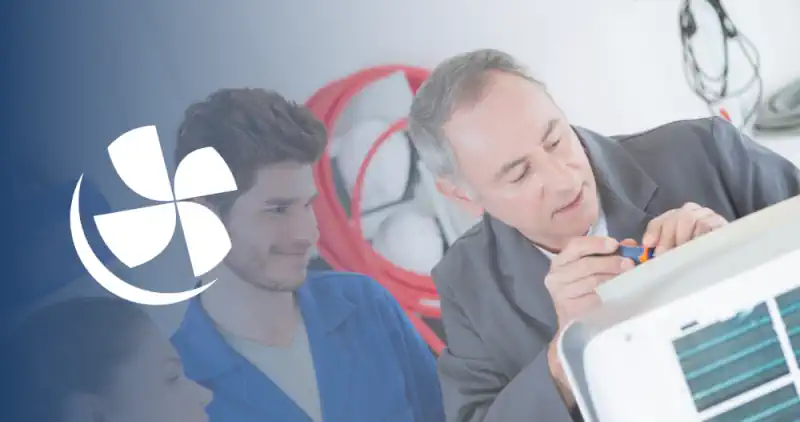 teacher showing students how to test hvac equipment