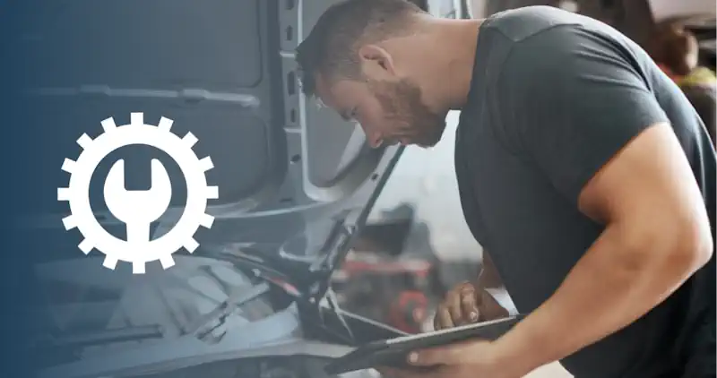 mechanic working on an automobile in a shop